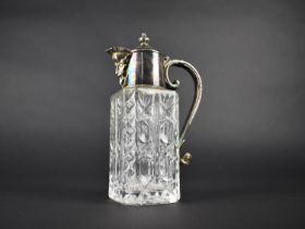 A Silver Plate and Glass Jug with Scrolled Handle and Mask Head Spout, 20cm high