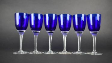 A Set of Six Wine Glasses with Cobalt Blue Bowl Raised on Twisted Plain Glass Stem and Circular