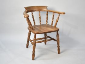 A Mid 20th Century Smokers Bow Armchair