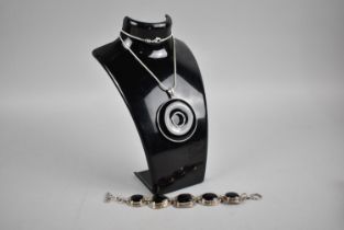 A Mexican Silver and Black Stone Five Section Bracelet Together a Similar Black Stone Pendant on