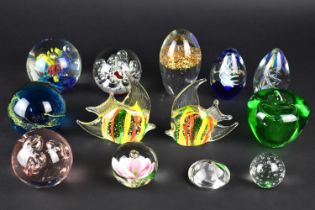 A Collection of Thirteen Various Glass Paperweights to Include Mdina etc