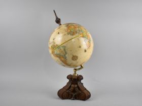 A Modern Replogle American Table Top Globe on Carved Scrolled Wooden Stand, 45.5cms High