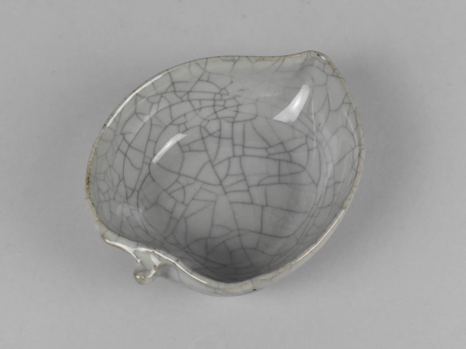 A Chinese Celadon Crackle Glazed Brush Washer in the Form of a Leaf, 15cm x 3.5cm high - Image 2 of 5