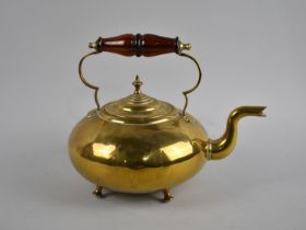 A Luxware Brass Kettle with Brown Glass Handle