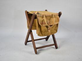 A Modern Sand and Storm Combination Folding Fishing Stool and Bags