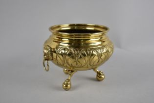 A Brass Circular Two Handled Bowl on Three Claw and Ball Feet, 18ms Diameter