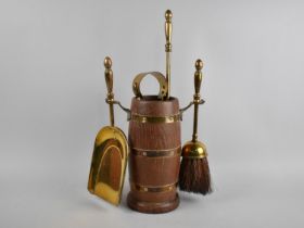 A Brass and Oak Fire Companion Set in the Form of a Coopered Barrel, Complete with Fire Irons,