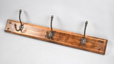 A Three Hook Coat Rail, 75cms Long