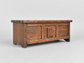 A Small Oak Box in the Form of a Coffer Chest, 18.5cms Long
