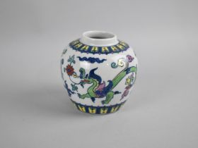 An Oriental Porcelain Ginger Jar Decorated with Dragons and Scrolls, 7cms High