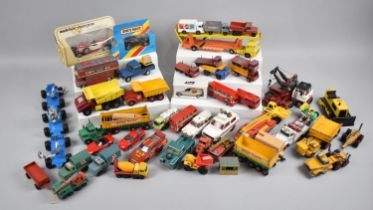 A Collection of Various Playworn Diecast Toys including a Small Number of Boxed Examples