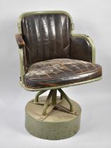 A Vintage Metal Framed Leather Upholstered Swivel Chair Set on Later Circular Metal Stand, Condition