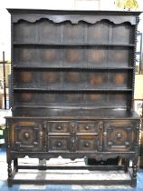 A Mid 20th Century Oak Dresser, Base with Two Centre Drawers Flanked by Cupboards, Raised Three