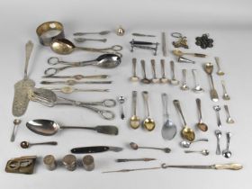 A Collection of Various Curios and Metalwares to Comprise Flatware, Spoons, White Metal Bottle Flask