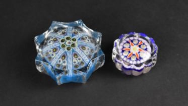 A Small Perthshire Glass Millefiori Paperweight with Scalloped Edge Together with a Larger Star