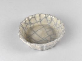 A Chinese Crackle Glazed Dish, 12cm Diameter