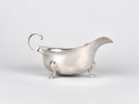 A Silver Sauce Boat by the Adie Brothers Ltd with Loop Handle and Raised on Three Pad Feet, 1934