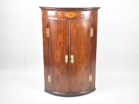 A 19th Century Bow Fronted Inlaid Wall Hanging Corner Cabinet with Brass Hinges, 67cms Diameter