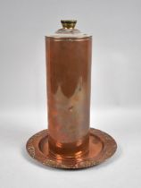 A Vintage Cylindrical Copper Bottle with Screw Off Brass Cap, 30cms High together with a Copper
