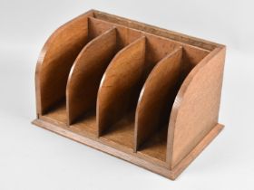 An Edwardian Oak Four Division Letter/Stationery Stand, 28cms Wide