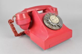 A Vintage Red Bakelite Telephone, Somewhat Faded