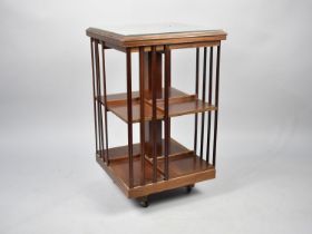 An Edwardian Inlaid Revolving Mahogany Bookcase, 47cms Square