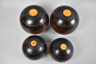 A Pair of Vintage Turned Wooden Lawn Bowls and a Pair of Jacks