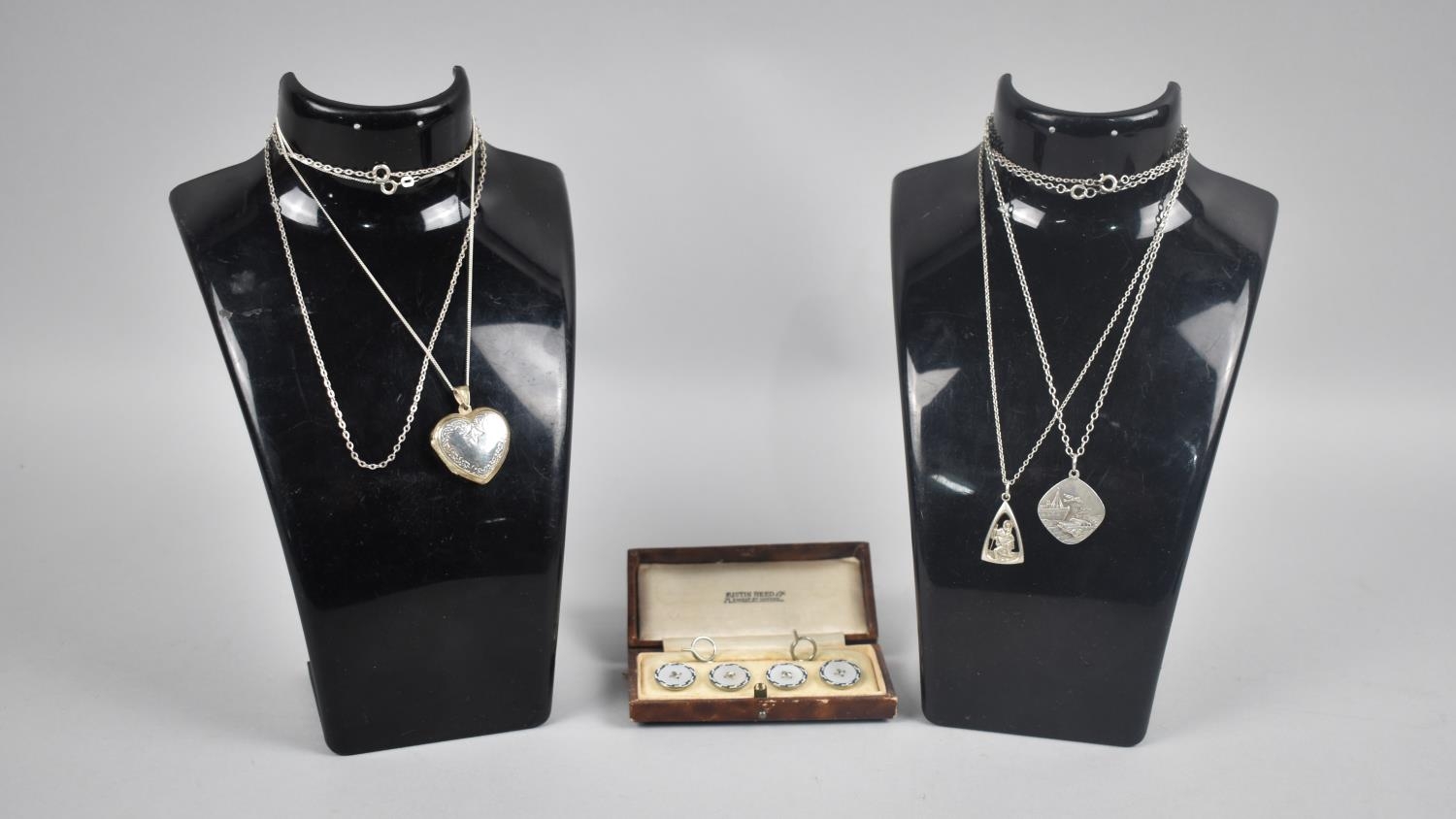 Three Silver Pendants on Chains to Include Heart Shaped Locket and Two St Michael Examples