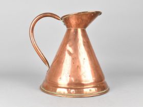 A Reproduction Copper Measuring Jug, 28cms High
