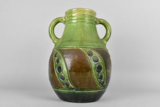 A Green Glazed Stoneware Twin Handled Vase with 'Pea Pod' Decoration to Belly, 25cm high