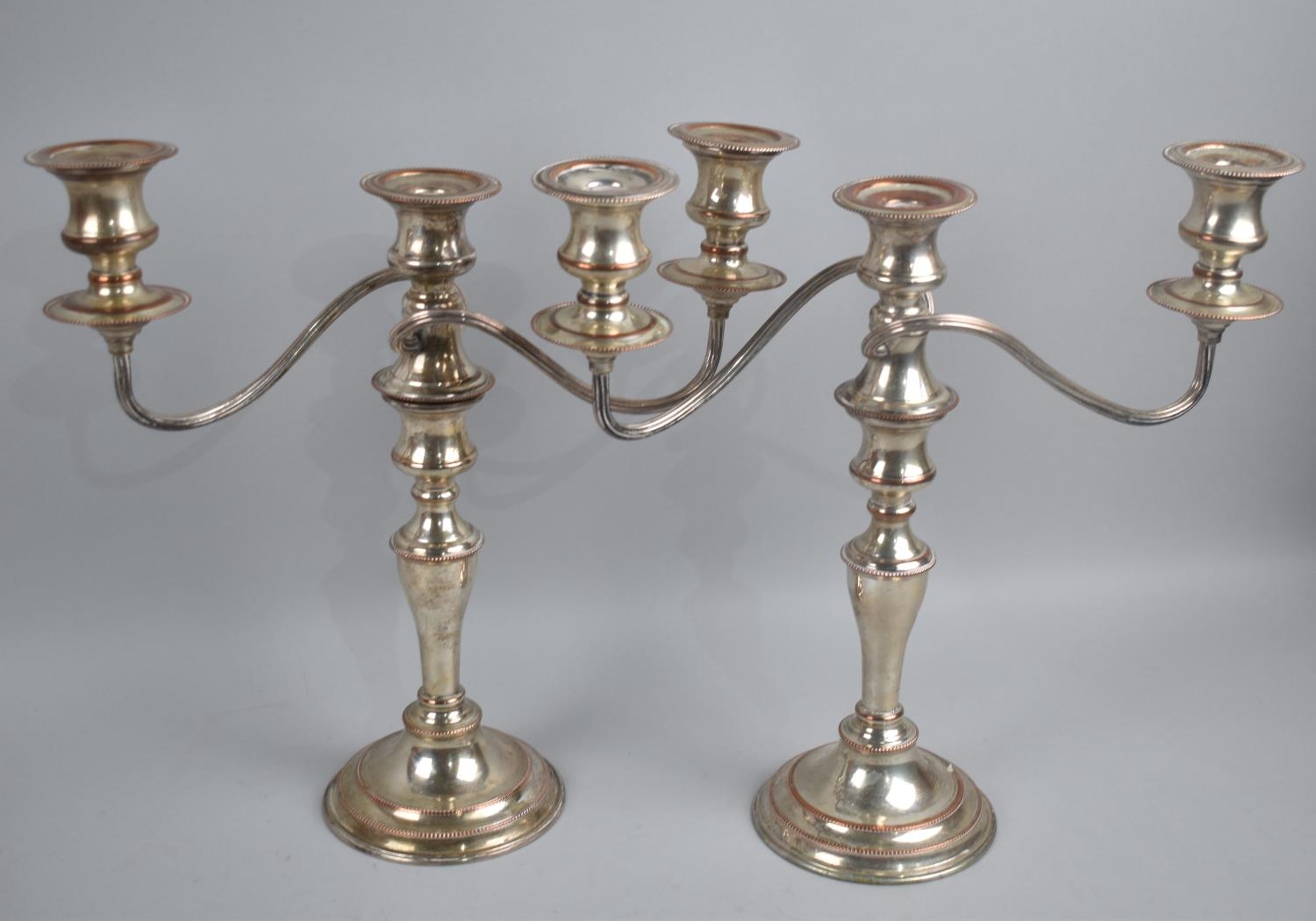 A Pair of Mid 20th Century Sheffield Plated Three Branch Candelabra, 30cms High