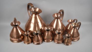 A Collection of Ten Graduated Copper Measures, the Largest 1 Gallon and the Smallest 1/4 Gill