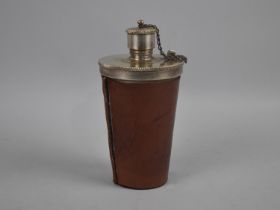 An Unusual Edwardian Leather Covered Silver Plated Flask with Removable Cap and Lid, 17cms High