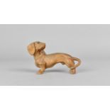 A Small Carved Wooden Study of a Dachshund, 8cms Long