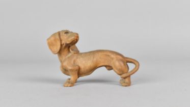 A Small Carved Wooden Study of a Dachshund, 8cms Long