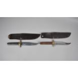 Two Mid 20th Century Wooden Venture Bowie Knives with Wooden and Horn Scales