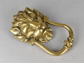 A Modern Cast Brass Lion Mask Door Knocker, 21cms High