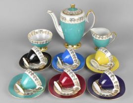 A Polish Porcelain Harlequin Coffee Set to Comprise Six Coffee Cans and Saucers, Coffee Pot, Milk