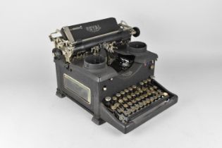 A Royal Manual Typewriter with Cover for 'Officency - European Office Equipments LTD'
