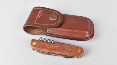 A Late 20th Century Leather Cased Multitool Pocket Knife, 8cms Long