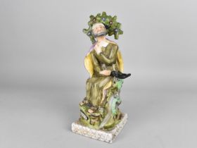 A Staffordshire Figure, Elijah Seated with Ravens on Marble Plinth Base, 26cm high, Some Condition