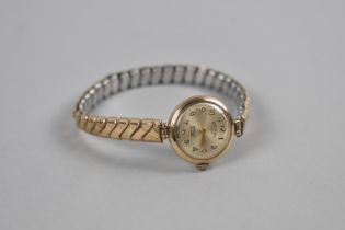 A 9ct Gold Ladies Rotary Wrist Watch, Champagne Dial with Gilt Arabic Numerals, 24 Jewel Incabloc