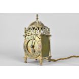 A Reproduction Brass Lantern Clock with electric Movement, 18cms High