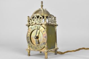 A Reproduction Brass Lantern Clock with electric Movement, 18cms High