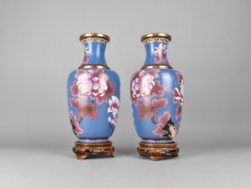 A Pair of Chinese Cloisonne Vases Decorated with Chrysanthemums and Butterflies, Set on Carved and