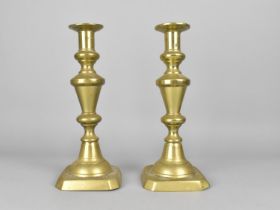 A Pair of Late 19th Century Brass Candlesticks with Pushers, 25cms High