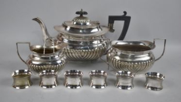 A Three Piece Silver Plated Tea Service and Collection of Six Napkin Rings