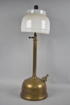 A Late Victorian/Edwardian Brass Paraffin Lamp with reeded Support and Opaque Glass Shade, 54cms