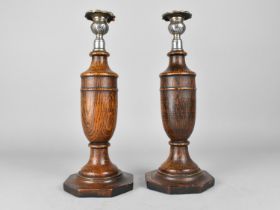 A Pair of Oak and Silver Plated Vase Shaped Candlesticks on Octagonal Bases, 30.5cms High