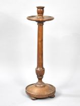 A Turned Wooden Ecclesiastic Style Candle Holder, 83cms High